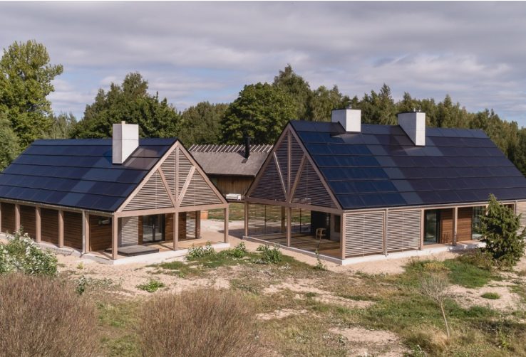 Long low building with integrated solar roof